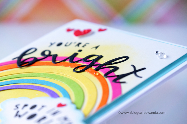 Distress Ink rainbow and background. Bright spot card