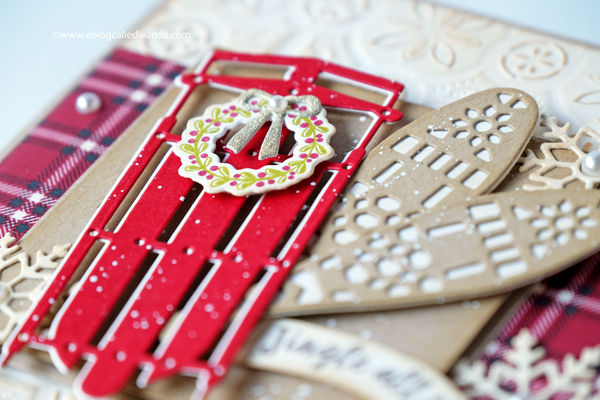 Vintage winter Christmas card with plaid and snowshoes