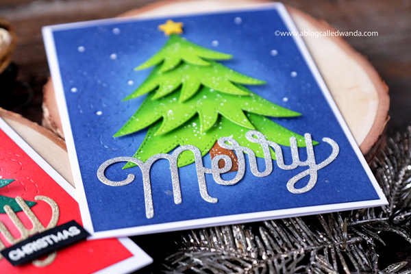 Pretty Pink Posh Layered Tree dies. Christmas card with distress inks