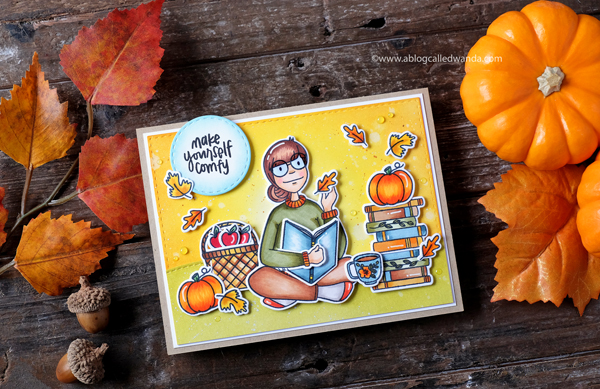 Ellen Hutson Cozy Lady and Bookworm Lady. Copic Markers. Distress Ink background