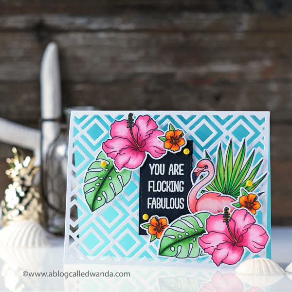 WPlus9 Tropic Fever and Flock Yeah stamps and dies. Trellis die cut. Tropical Theme card with copics.
