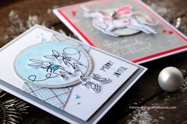 Pinkfresh Studio Holiday Winter Christmas cards. Magical Unicorn and Skating Bunnies