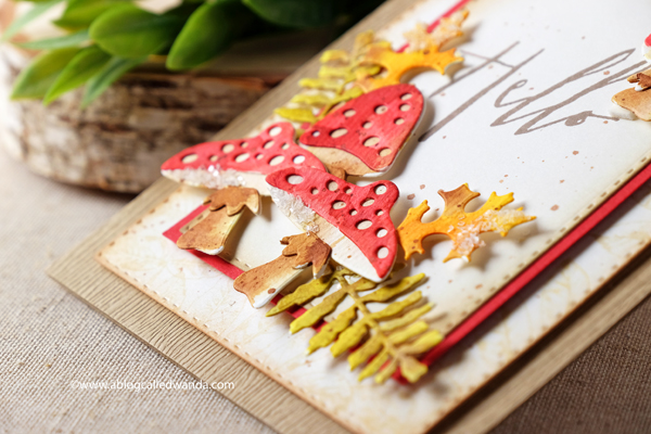 Handstamped background with Tim Holtz Nature's Wonder leaves stamp set