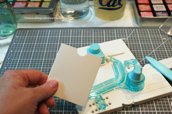 WE R MEMORY KEEPERS POCKET PUNCH BOARD