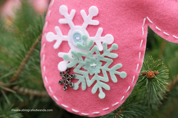 Hand stitched felt ornaments. TE felt