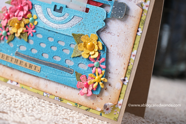 Tim Holtz Retro Type Die and Tiny Type Alphabet. Distress Inks. Mixed media. Tattered florals. Distress inks. Handmade card with Tim Holtz supplies. Wanda Guess