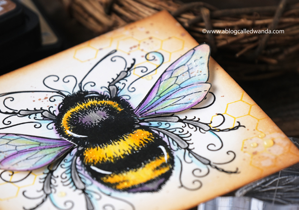 Bee stamp from Pink Ink Designs UK. Colored with Polychromos Pencils. Distress ink blending. Honeycomb. Nuvo clear drops. Bee theme card. Vintage. Wanda Guess