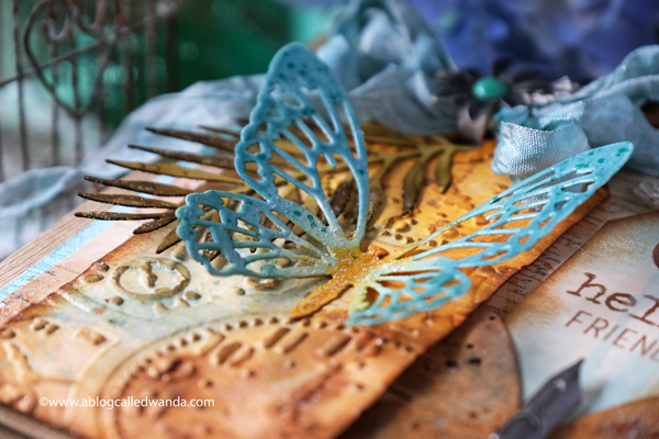 Tim Holtz, Sizzix, Ideaology, Stampers Anonymous, Speckled Egg Distress Ink, TIm Holtz Techniques. Butterfly card. Butterfly dies, Tropical Thinlets, Glorious Bouquet stamps. Distress Ink vintage card. Wanda Guess