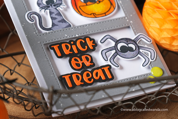 Photoplay Paper Say it with Stamps and dies. Halloween Card. Slimline card ideas. Copic coloring Halloween. Rectangle cut outs. Fun DIY Halloween. Wanda Guess