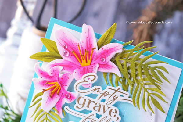 the greetery, the greetery new release, the greetery spring fever, the greetery easter, the greetery carrot die, the greetery bunny hop, the greetery wildflower mix dies, the greetery watering can, the greetery print shop, bow dies, watercolor, distress inks, empty grave stamp set, comforting commands, nordic circles, the greetery square dance dies and stencil, the greetery gingham, wanda guess, design team, a blog called wanda