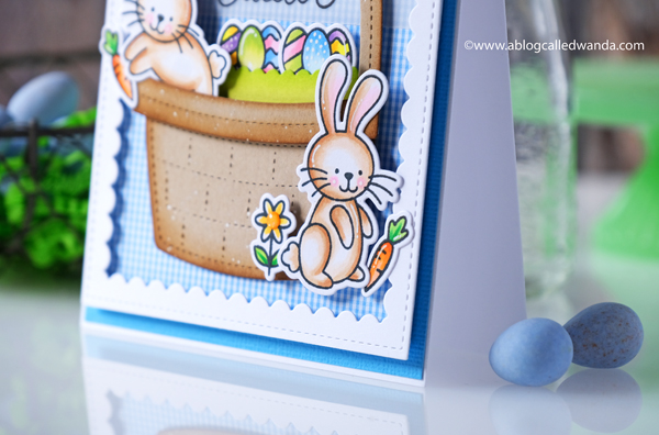 pretty pink posh, pretty pink posh new release, easter, spring, easter basket die, bunnies, watercolor, embossing, happy easter die, easter card ideas, copics, scallop frames, mijello, gingham, vellum, ppp instagram hop, wanda guess, a blog called wanda