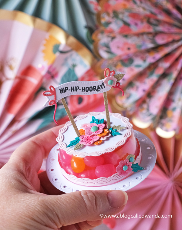 Bridal Shower, birthday party, favors. The Greetery new release. Confetti Collection. Cake Pops Dies, Cake Stand Dies, Cake Pops Banners, Cake Pops sentiments. Birthday party favors and ideas. Treat containers stamping and die cutting. The Greetery Design Team Wanda Guess