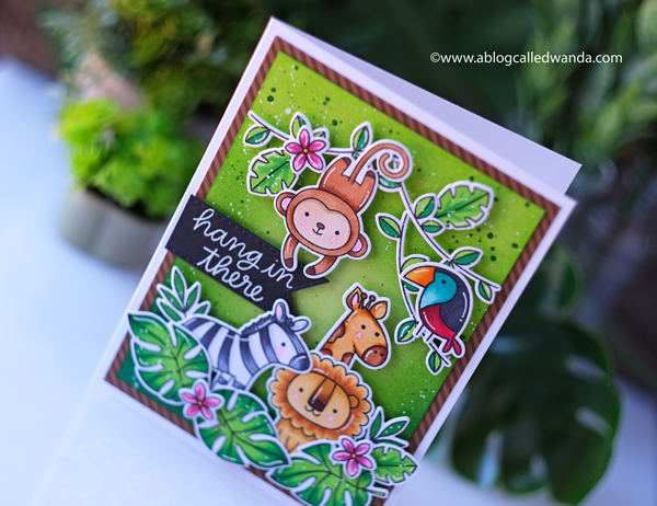 Pretty Pink Posh June 2020 new release blog hop. Jungle themed stamps and dies. Jungle Friends stamp set, Monkey Friends stamp set, Tropical Toucans stamp set, Animal Signs stamp set, Hibiscus Flowers stamp set, Copics, Distress ink blending backgrounds. Wanda Guess