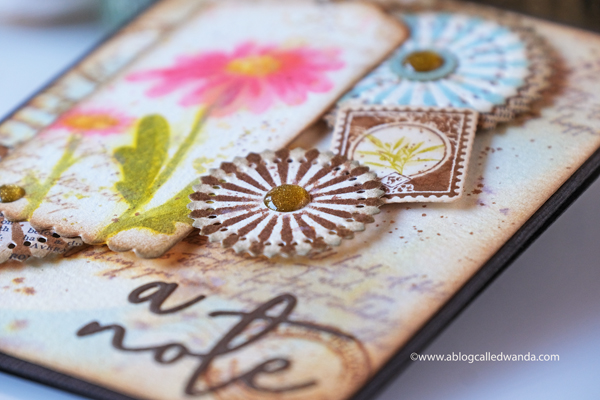 The Greetery Inspiration Friday. The Greetery Design Team. Distress Inks. Vintage theme card with stamps and dies. Watercolor with distress ink. The Greetery Oopsie Daisy, The Greetery Pretty Postmarks, The Greetery Pinwheel Party, The Greetery Speed Tagging. Wanda Guess Card layout ideas