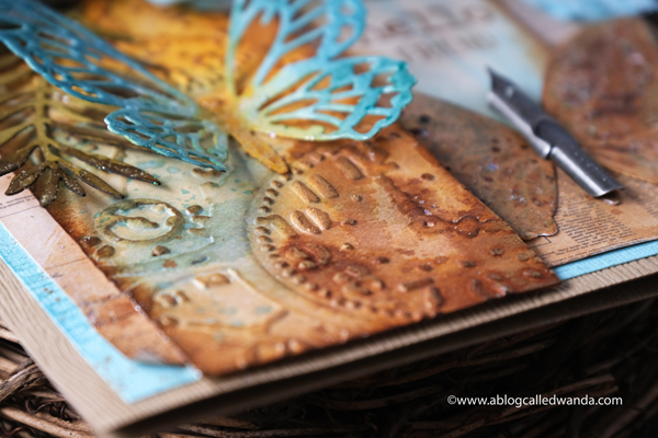 Tim Holtz, Sizzix, Ideaology, Stampers Anonymous, Speckled Egg Distress Ink, TIm Holtz Techniques. Butterfly card. Butterfly dies, Tropical Thinlets, Glorious Bouquet stamps. Distress Ink vintage card. Wanda Guess