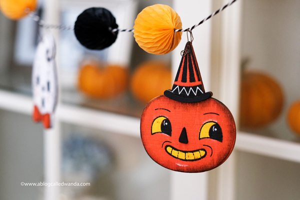 halloween decor, halloween decorations, tiered tray ideas, halloween fun, festive, decorations, party, garland, honeycomb balls, vintage halloween, wanda guess