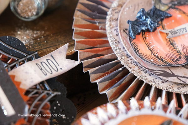 halloween, rosettes, medallions, paper rosettes, paper medallions, tim holtz, vintage halloween, halloween decorations, brenda walton dies, sizzix, glitter, ideaology, tim holtzt snarky cats halloween, pumpkinhead stamps, tim holtz halloween, halloween party ideas, vintage looking decorations, papercrafting, card making, wanda guess, a blog called wanda