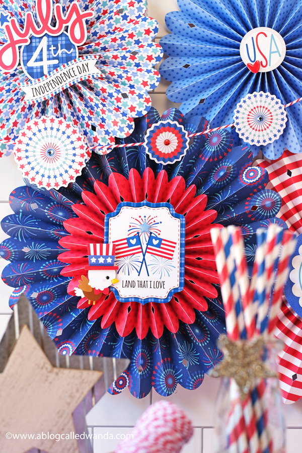 doodlebug, doodlebug papers, doodlebug land that i love collection, patriotic crafts, red white and blue, 4th of july decorations, 4th of july crafts, rosettes, sizzix medallion die, brenda walton dies, patriotic party ideas, 4th of july decor, paper rosettes, paper medallions, wanda guess, a blog called wanda