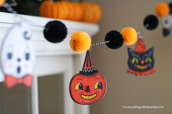 halloween decor, halloween decorations, tiered tray ideas, halloween fun, festive, decorations, party, garland, honeycomb balls, vintage halloween, wanda guess