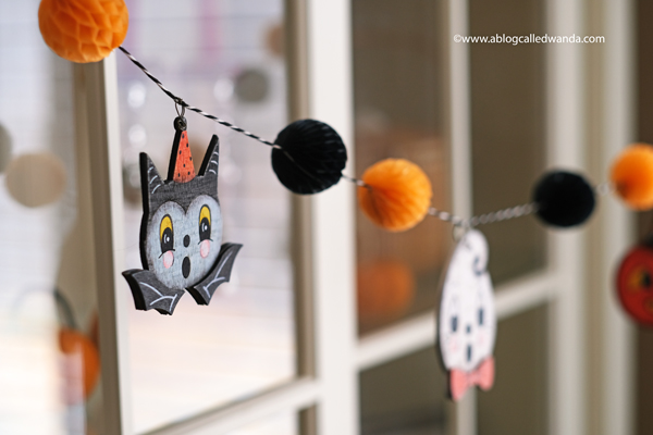 halloween decor, halloween decorations, tiered tray ideas, halloween fun, festive, decorations, party, garland, honeycomb balls, vintage halloween, wanda guess