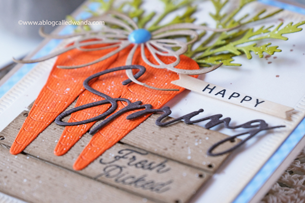 the greetery, the greetery new release, the greetery spring fever, the greetery easter, the greetery carrot die, the greetery bunny hop, the greetery wildflower mix dies, the greetery watering can, the greetery print shop, bow dies, watercolor, distress inks, empty grave stamp set, comforting commands, nordic circles, the greetery square dance dies and stencil, the greetery gingham, wanda guess, design team, a blog called wanda