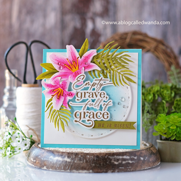 the greetery, the greetery new release, the greetery spring fever, the greetery easter, the greetery carrot die, the greetery bunny hop, the greetery wildflower mix dies, the greetery watering can, the greetery print shop, bow dies, watercolor, distress inks, empty grave stamp set, comforting commands, nordic circles, the greetery square dance dies and stencil, the greetery gingham, wanda guess, design team, a blog called wanda