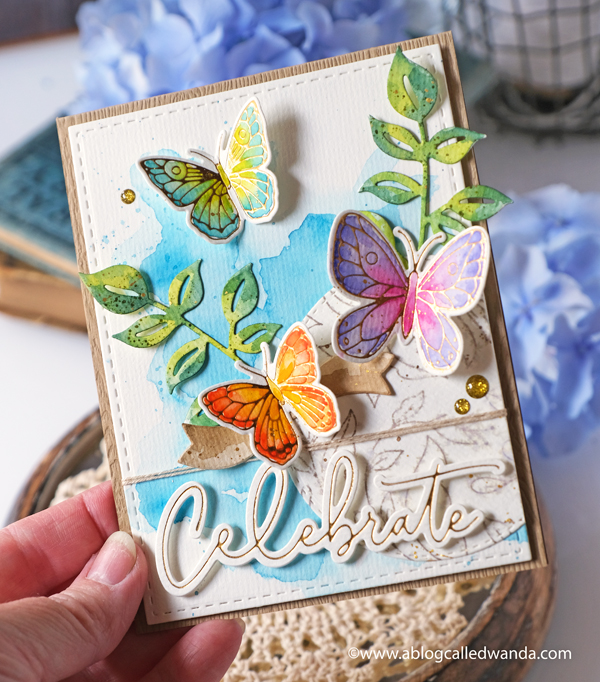 pinkfresh studio, pinkfresh studio blog hop, new release, blueberries and lemons, hot foil system, butterflies, vellum, watercolor, cards, card ideas, handmade cards, spellbinders hot foil system, mijello watercolors, leafy branch die, artistic bow die, wanda guess, a blog called wanda