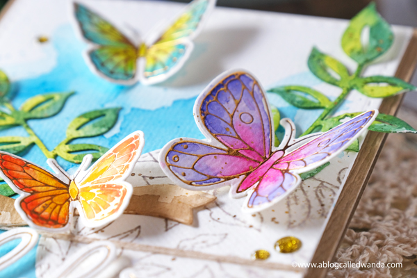 pinkfresh studio, pinkfresh studio blog hop, new release, blueberries and lemons, hot foil system, butterflies, vellum, watercolor, cards, card ideas, handmade cards, spellbinders hot foil system, mijello watercolors, leafy branch die, artistic bow die, wanda guess, a blog called wanda