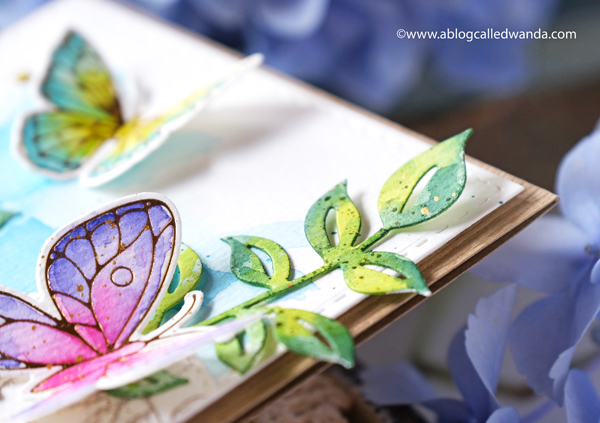 pinkfresh studio, pinkfresh studio blog hop, new release, blueberries and lemons, hot foil system, butterflies, vellum, watercolor, cards, card ideas, handmade cards, spellbinders hot foil system, mijello watercolors, leafy branch die, artistic bow die, wanda guess, a blog called wanda