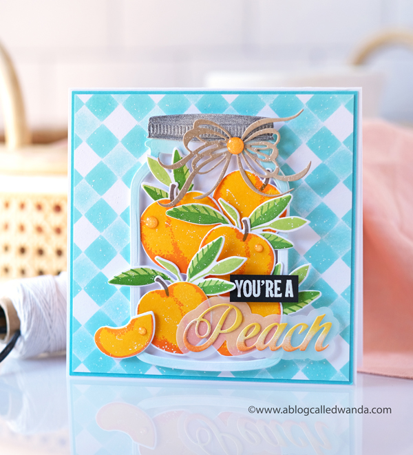 The Greetery, The Greetery Blog, The Greetery Inspiration Friday, TGIF, Wanda Guess, The Greetery Just Peachy, Peachy Keen, Stencils, Square Dance Stencils, The Greetery Jumbo Jar, The Greetery fit to be tied bow dies, mason jar card ideas, Summery Card, Vellum, Gingham, Peaches stamps and dies, A blog called wanda