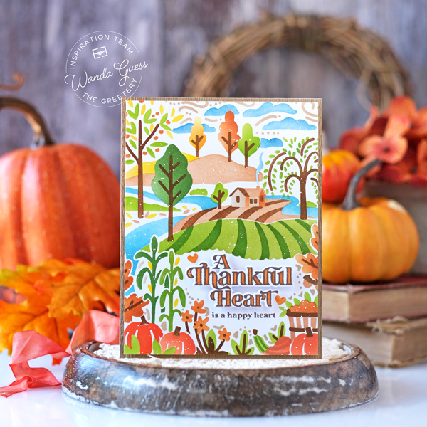 the greetery, the greetery new release, the greetery calico fields, the greetery stamps and dies, the greetery thankful heart, stencils, stencilscape, rolling hills, countryside, die cutting card ideas, fall cards, stencils on cards, distress inks, wanda guess, a blog called wanda