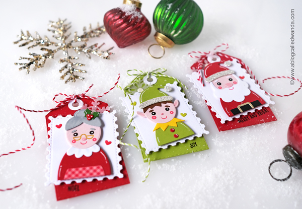 taylored expressions holiday squad, taylored expressions postage stamp stacklets, taylored expressions noel stamp and stencil, stencils, blender brushes, glitter paste, tags, christmas, holiday, elf, santa, mrs claus, make your own christmas tags, christmas cards, stencils with distress ink, blender brushes, classic christmas cards, card ideas, tag ideas, wanda guess, a blog called wanda