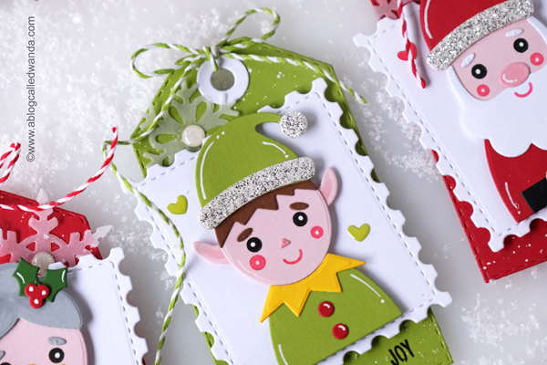 taylored expressions holiday squad, taylored expressions postage stamp stacklets, taylored expressions noel stamp and stencil, stencils, blender brushes, glitter paste, tags, christmas, holiday, elf, santa, mrs claus, make your own christmas tags, christmas cards, stencils with distress ink, blender brushes, classic christmas cards, card ideas, tag ideas, wanda guess, a blog called wanda