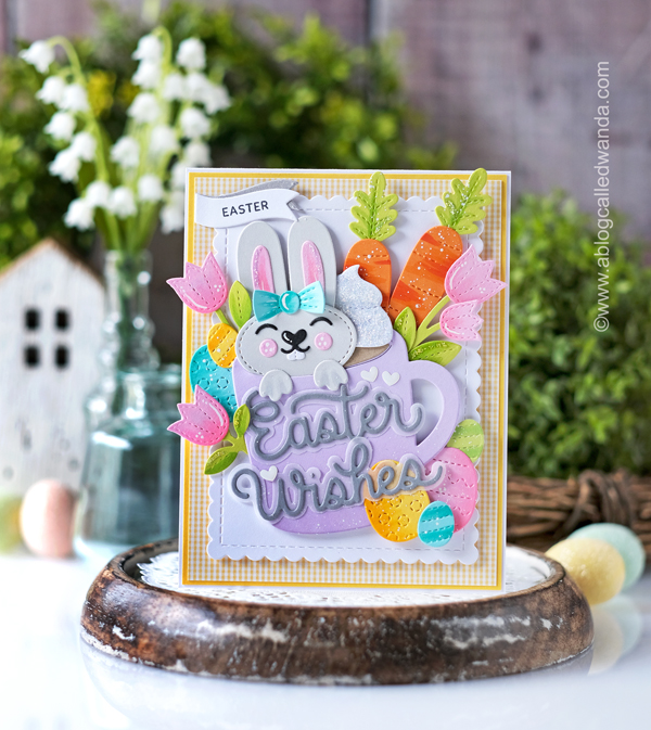 Pretty Pink Posh, pretty pink posh new release, pretty pink posh easter, stamps and dies, stencils, easter, spring, bunny, easter bunny, mug, spring foliage dies, spring chicks stamp set, pretty pink posh scallop box card, pop up card, easter ideas, easter mug additions, leafy spring wreath, handmade, diy, copic coloring, wanda guess, a blog called wanda