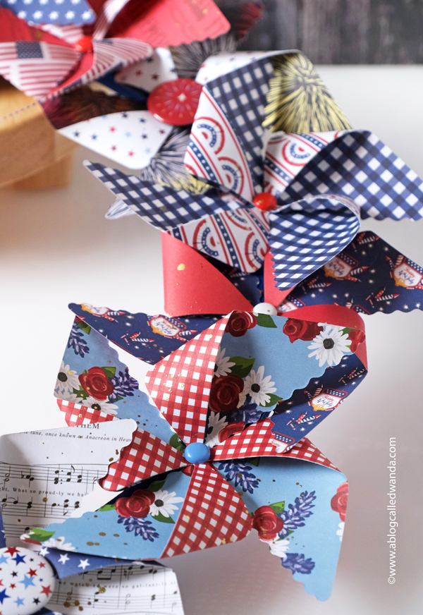 pretty pink posh, pretty pink posh pinwheels, 3d pinwheels, wreath, paper wreath, pinwheel wreath, 4th of july, americana, home decor, usa decorations, wanda guess, a blog called wanda