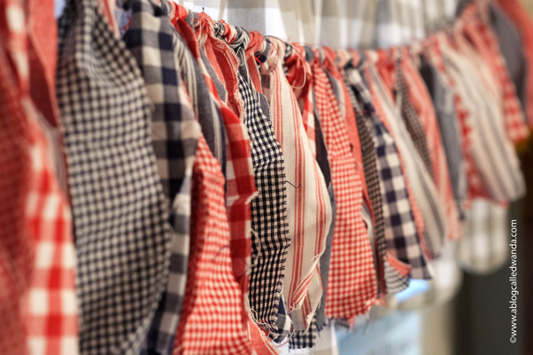 fabric garland, fabric strip garland, moda jelly roll, fabric ideas, home decor garland, make your own fabric garland, diy, gingham, 4th of july, halloween, shabby chic, wanda guess, a blog called wanda