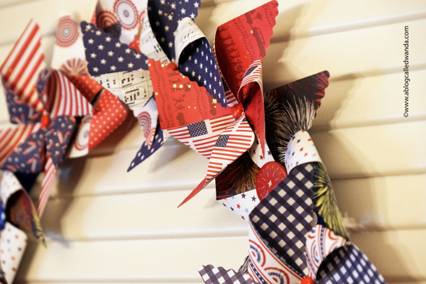 pretty pink posh, pretty pink posh pinwheels, 3d pinwheels, wreath, paper wreath, pinwheel wreath, 4th of july, americana, home decor, usa decorations, wanda guess, a blog called wanda