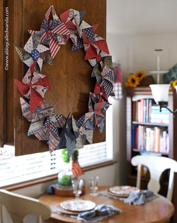 pretty pink posh, pretty pink posh pinwheels, 3d pinwheels, wreath, paper wreath, pinwheel wreath, 4th of july, americana, home decor, usa decorations, wanda guess, a blog called wanda