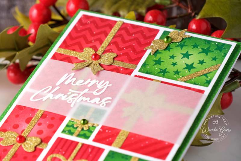 the greetery, the greetery stamps and dies, the greetery christmas, gifts galore stencils, presents, merry christmas, christmas card ideas, handmade christmas cards, stencils, distress inks, wanda guess, a blog called wanda